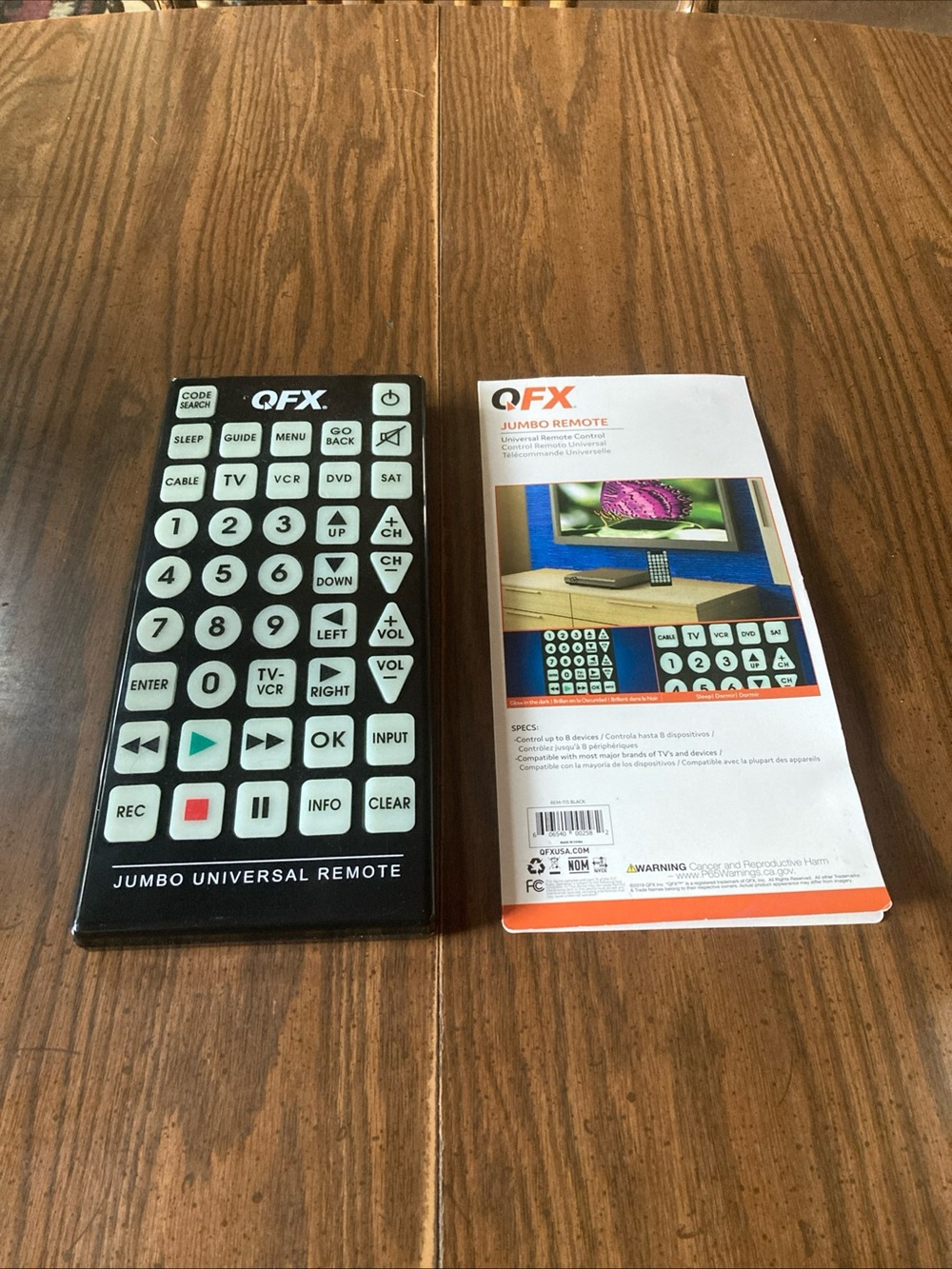 QFX Jumbo Universal Remote in Black and White works!! Instructions included